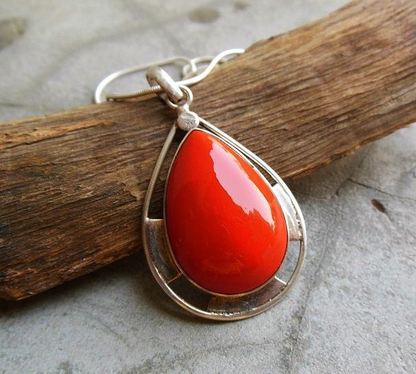 Artisan red coral stone pendant
