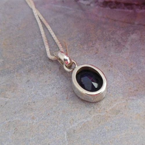 Dark blue sapphire pendant necklace, Silver oval pendant