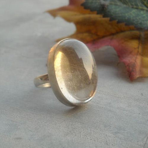 Golden rutile white quartz ring