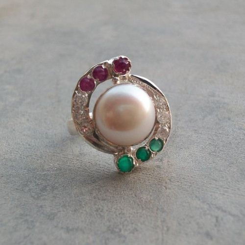 Pearl ring emerald ring ruby
