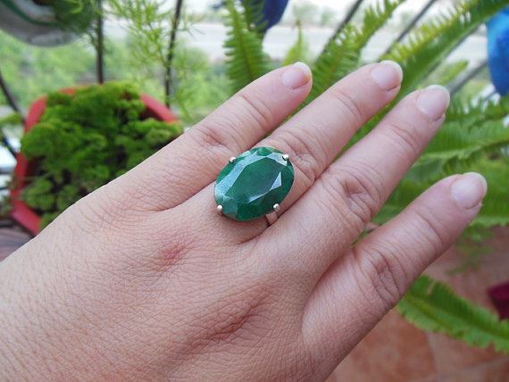 Precious emerald solitaire ring May